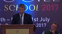 Edwin Poots addresses gathering in Irish