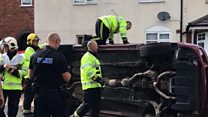 Footage of Tipton car on its side