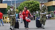 Thousands leave Venezuela before strike