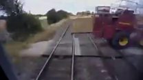 Watch: Train in near miss with tractor