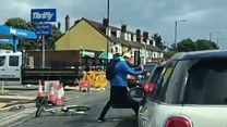 Cyclist and driver filmed fighting