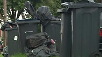 The home with 15 rubbish bags outside