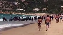 Migrant boat lands on southern Spanish beach