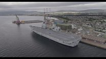 Drone films carrier before landing on deck