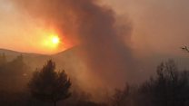 High winds as wildfires burn in Greece