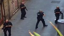 Armed police comb streets after attack