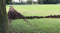 War-like trench dug around playing field