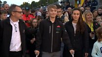 Teen race driving amputee completes charity walk