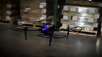 Flying drone scans warehouse packages