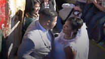 'We married through Mexico border fence'