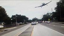 Plane smashes into highway