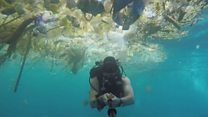 Diver films 'horrifying plastic cloud'