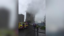 Crews tackle fire at high-rise flats