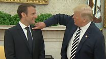 Trump brushes dandruff off 'perfect' Macron