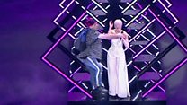 Stage invader interrupts SuRie performance
