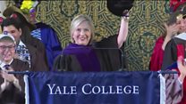 Clinton brings Russian hat to ceremony