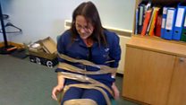'They grabbed me and taped me to a chair'