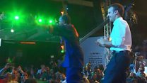 Macron boogies at Nigeria nightclub