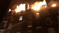 100 firefighters tackle blaze at flats