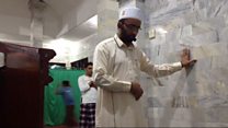Imam prays on as quake hits Bali mosque