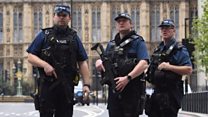Armed police at Westminster crash site