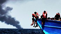 Libya migration: 'Their dead infants floating beside them'