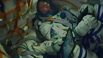 Astronauts back to Earth after malfunction