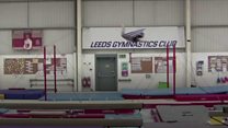 Gymnast sets horizontal bar backflip record