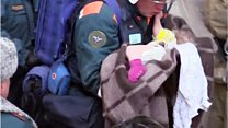 Russian rescuers pull baby from rubble