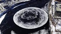Giant ice disk appears in US river
