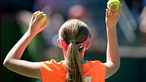 ما معنى عبارة Throwing and catching balls؟