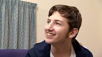 Brain injury boy learns to shop and bake