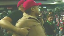 Trump supporter shoves BBC cameraman