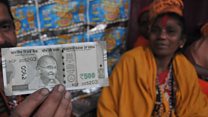 Former India FM defends minimum income scheme
