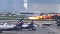 Burning plane makes emergency landing