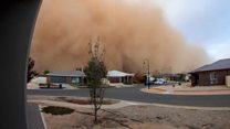 Massive dust cloud engulfs city