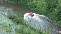 Car stuck after driving through flood