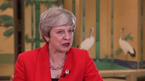 May: Russia must stop 'destabilising'