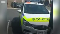 Man filmed driving unattended police car