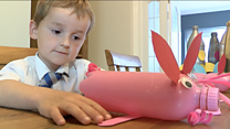 Boy makes piggy banks from plastic waste