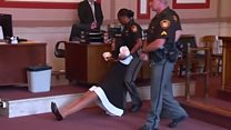 Former US judge dragged to jail