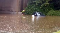 Cyclist makes it through Edinburgh flood water