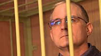 Is this man a hostage of Russia or a spy?
