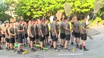 Chinese soldiers clean up Hong Kong streets