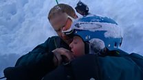Dad rescues son who fell into hole while skiing