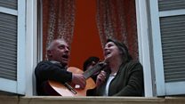 Italians sing from their windows to defy coronavirus