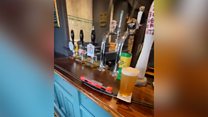 Locked-down pub manager serves beer on model train