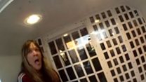 'Appalling' video shows woman coughing at officer