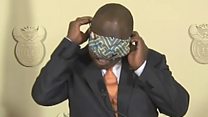 South African president's face mask struggle