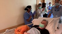Applause as 'remarkable survivor' leaves ICU ward